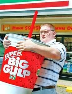 I don't think this Super Big Gulp will fit in a car's cup holder